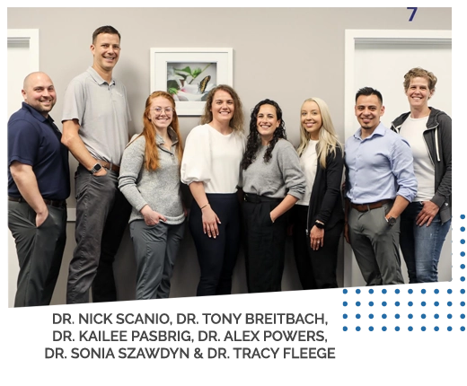 Chiropractor Evanston IL Tony Breitbach With Team